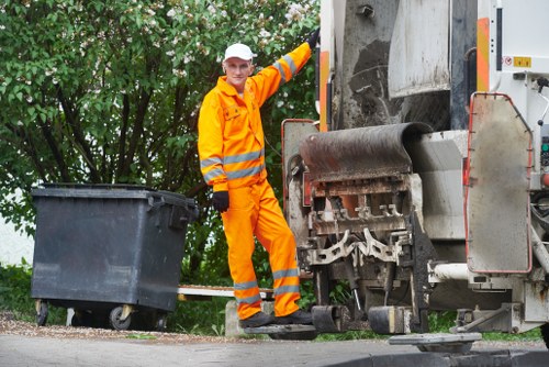 Scheduled rubbish collection in a North London neighborhood